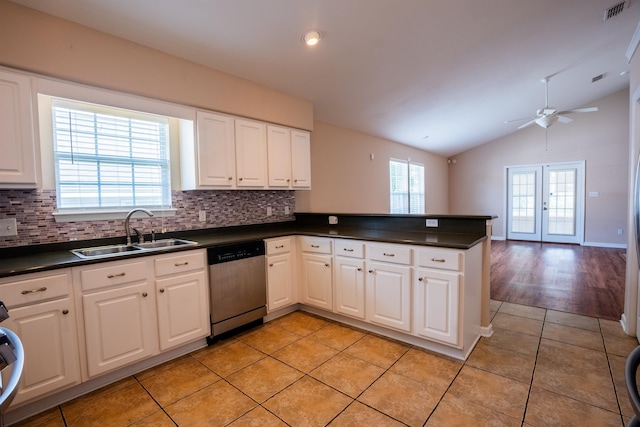 9321 Royal Troon Dr, Tallahassee, FL 32312 - kitchen featuring dishwasher, a sink, dark countertops, backsplash, and a ceiling fan