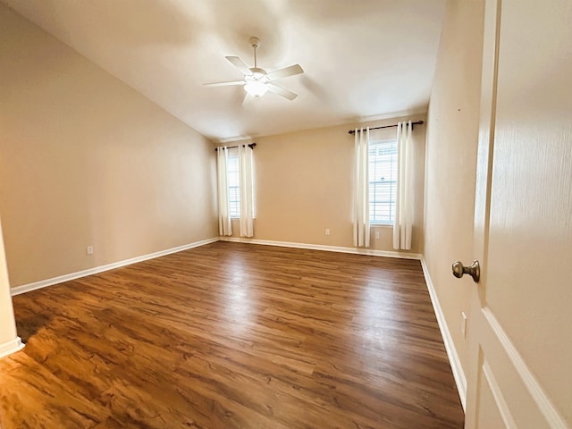 9321 Royal Troon Dr, Tallahassee, FL 32312 - unfurnished room with plenty of natural light, a ceiling fan, dark wood-type flooring, baseboards, and vaulted ceiling
