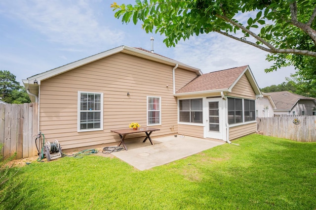 9321 Royal Troon Dr, Tallahassee, FL 32312 - back of house featuring a patio and a sunroom