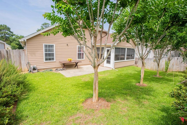 9321 Royal Troon Dr, Tallahassee, FL 32312 - back of property with a patio area and a sunroom