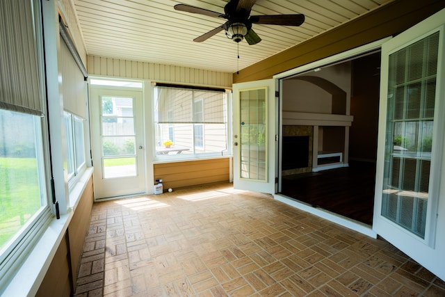 9321 Royal Troon Dr, Tallahassee, FL 32312 - unfurnished sunroom featuring ceiling fan