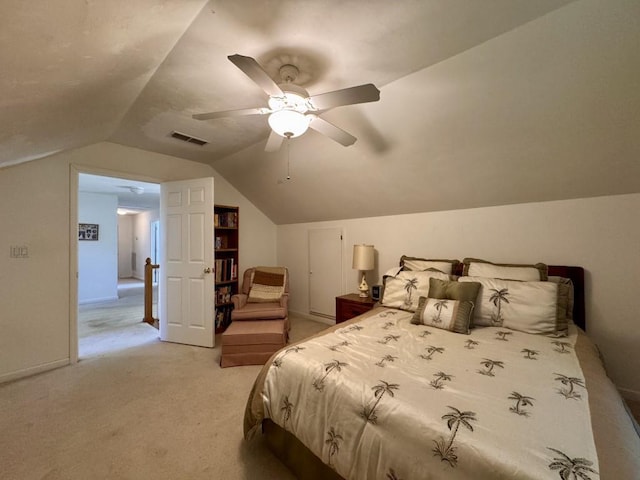 bedroom with visible vents, light carpet, ceiling fan, and vaulted ceiling