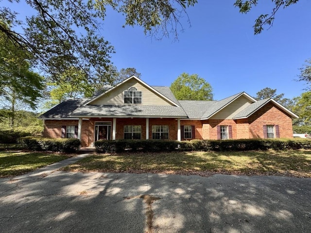 view of front of home with brick siding