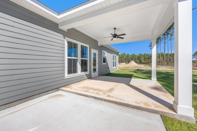 view of patio featuring ceiling fan