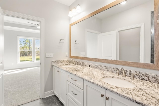 bathroom with tile patterned floors, ceiling fan, and vanity