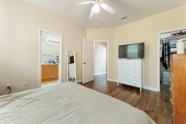 3400 Old Bainbridge Rd Unit 108, Tallahassee, FL 32303 - bedroom with wood finished floors, visible vents, ensuite bath, a closet, and a walk in closet