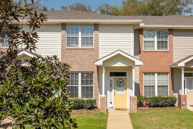 3400 Old Bainbridge Rd Unit 108, Tallahassee, FL 32303 - multi unit property with a front yard, brick siding, and a shingled roof