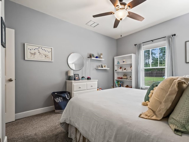 carpeted bedroom with ceiling fan