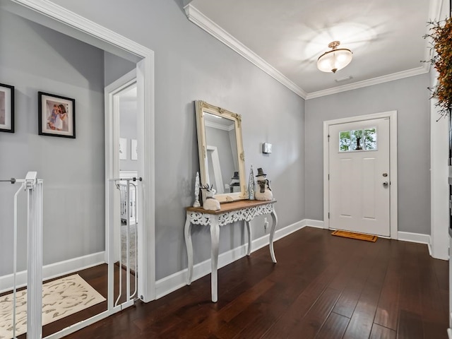 entryway featuring dark hardwood / wood-style floors and ornamental molding