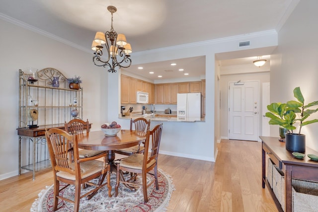 121 N Monroe St Unit 1103, Tallahassee, FL 32301 - dining area featuring light wood-style floors, crown molding, baseboards, a chandelier, and recessed lighting
