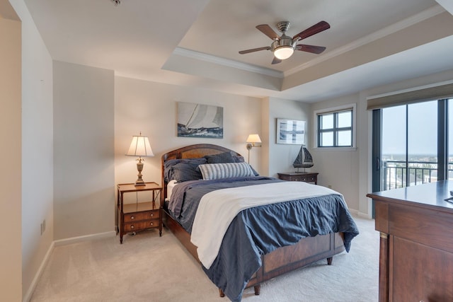 121 N Monroe St Unit 1103, Tallahassee, FL 32301 - bedroom with light carpet, access to outside, a raised ceiling, ornamental molding, and baseboards