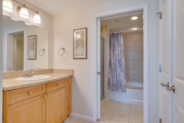 121 N Monroe St Unit 1103, Tallahassee, FL 32301 - bathroom featuring vanity, tile patterned flooring, shower / bath combination with curtain, and baseboards