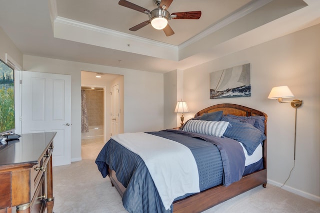 121 N Monroe St Unit 1103, Tallahassee, FL 32301 - bedroom featuring a tray ceiling, crown molding, light carpet, baseboards, and connected bathroom