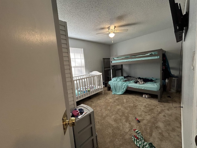 2230 Parrot Ln, Tallahassee, FL 32303 - carpeted bedroom featuring ceiling fan and a textured ceiling