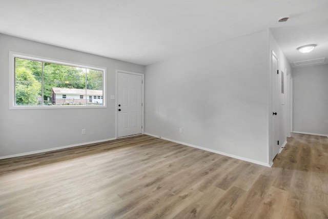 319 Meadowbrook Ln, Tallahassee, FL 32304 - unfurnished room with light wood-style floors and baseboards