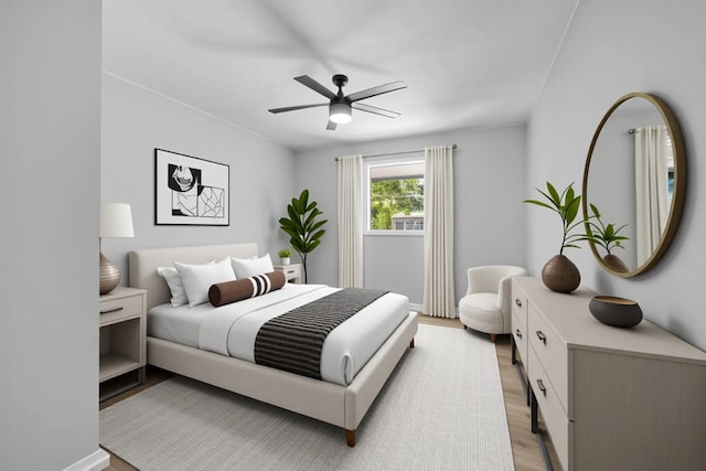 319 Meadowbrook Ln, Tallahassee, FL 32304 - bedroom with light wood-type flooring, ceiling fan, and baseboards