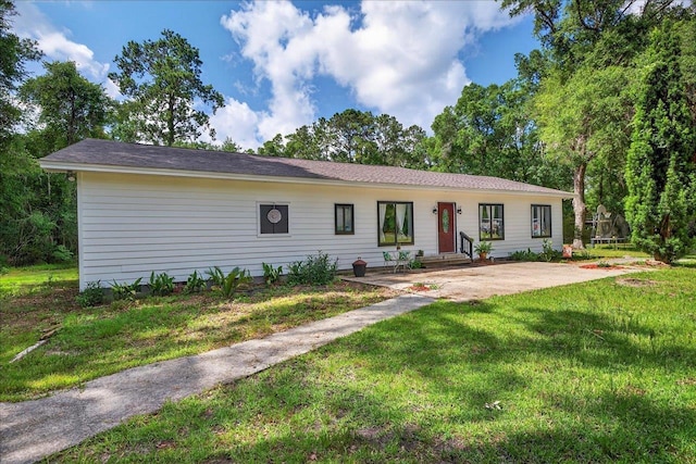 147 Hawk Ridge Dr, Havana, FL 32333 - ranch-style house featuring a trampoline, a patio, and a front yard