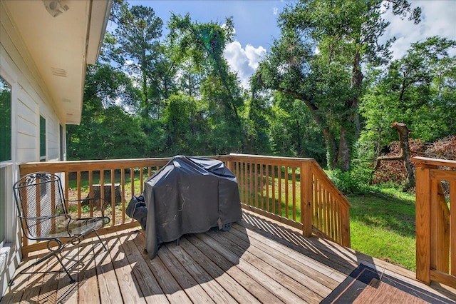 147 Hawk Ridge Dr, Havana, FL 32333 - wooden deck with a grill