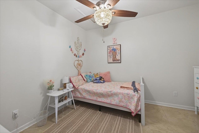 147 Hawk Ridge Dr, Havana, FL 32333 - tiled bedroom with baseboards and a ceiling fan
