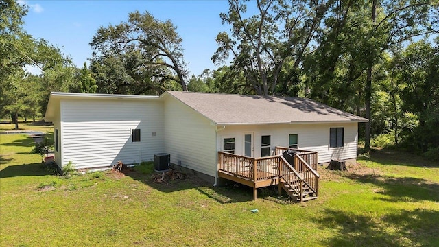 147 Hawk Ridge Dr, Havana, FL 32333 - rear view of house featuring a wooden deck, a yard, and a shingled roof