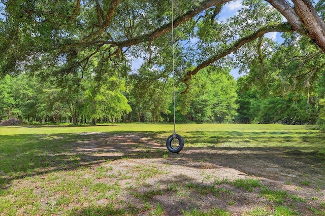 147 Hawk Ridge Dr, Havana, FL 32333 - view of grassy yard with a forest view