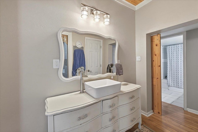 147 Hawk Ridge Dr, Havana, FL 32333 - bathroom featuring wood finished floors and vanity
