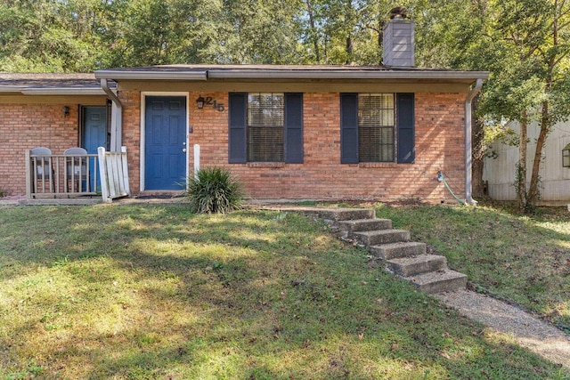 ranch-style house with a front lawn