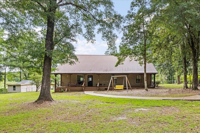 back of property with a yard