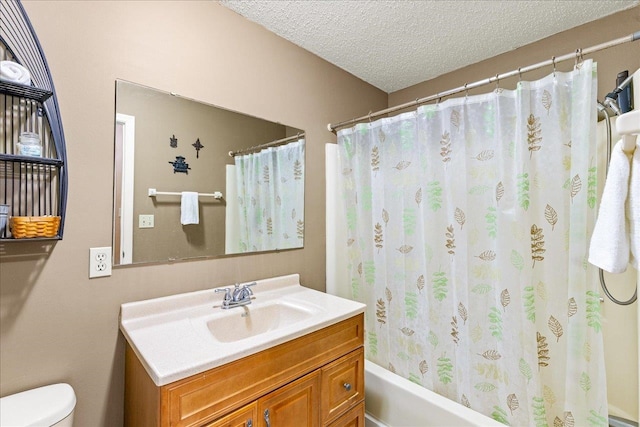 full bathroom with vanity, shower / bath combo with shower curtain, a textured ceiling, and toilet
