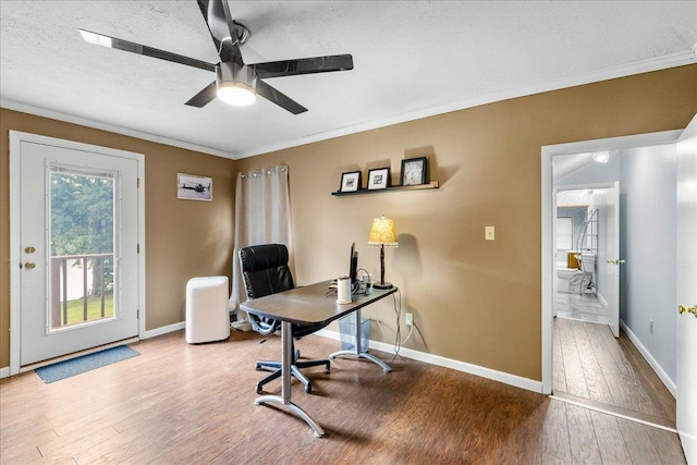 office with hardwood / wood-style flooring, ceiling fan, a textured ceiling, and ornamental molding