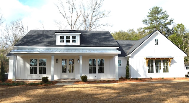 modern farmhouse style home with a porch