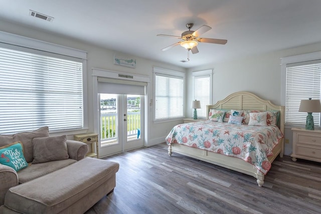 bedroom with dark wood-type flooring, french doors, ceiling fan, and access to exterior