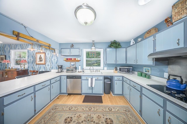 3006 Southshore Cir, Tallahassee, FL 32312 - kitchen with a sink, stainless steel appliances, and blue cabinetry