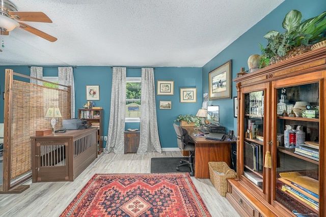 3006 Southshore Cir, Tallahassee, FL 32312 - office area featuring a textured ceiling, wood finished floors, baseboards, and ceiling fan