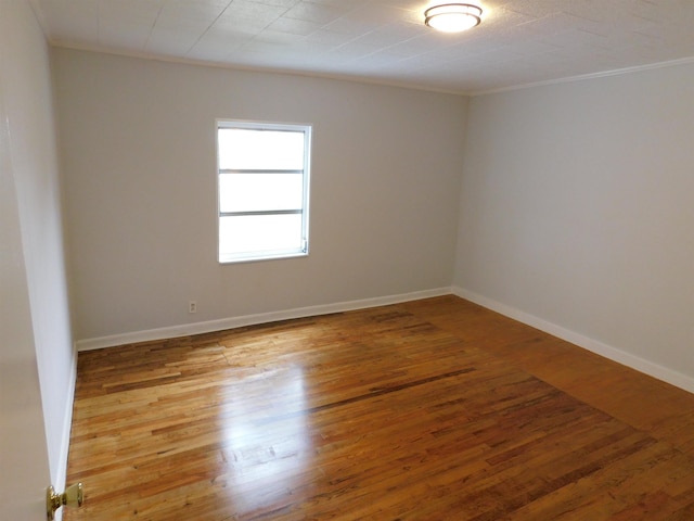 118 N Virginia St, Quincy, FL 32351 - spare room with ornamental molding, wood finished floors, and baseboards