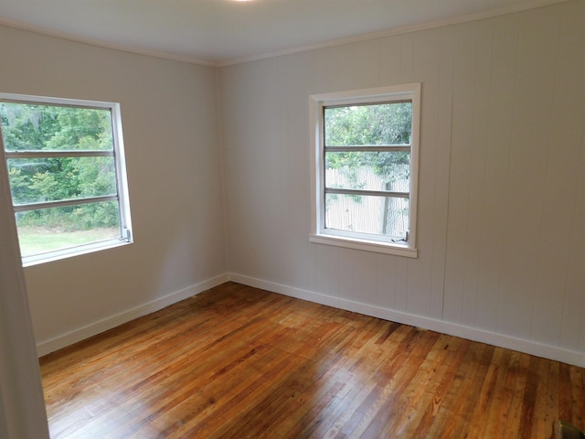 118 N Virginia St, Quincy, FL 32351 - empty room with light wood-style floors, ornamental molding, and baseboards