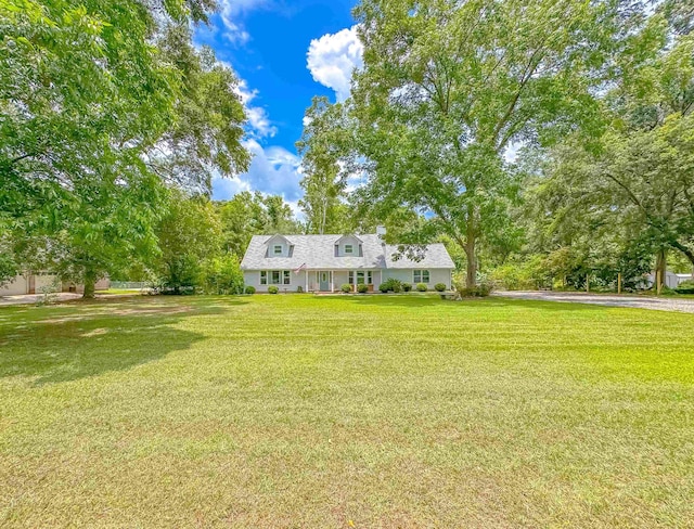 7420 Hickock Ct, Tallahassee, FL 32311 - cape cod-style house featuring a front lawn