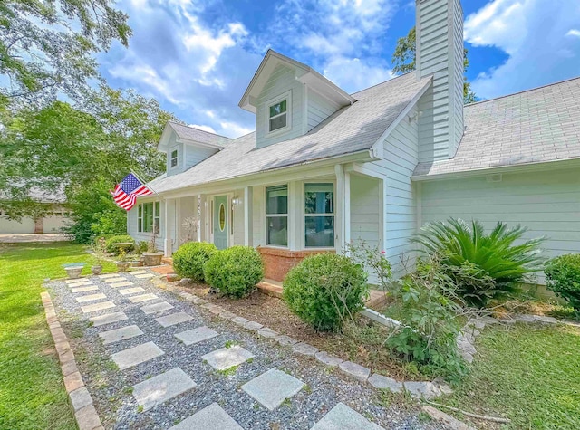 7420 Hickock Ct, Tallahassee, FL 32311 - view of side of home with a chimney and a yard