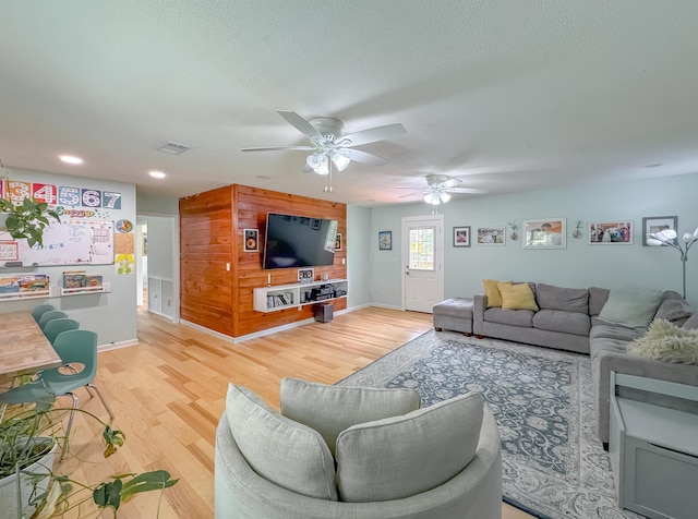 7420 Hickock Ct, Tallahassee, FL 32311 - living room with a ceiling fan, light wood-type flooring, recessed lighting, and a textured ceiling