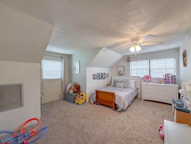 7420 Hickock Ct, Tallahassee, FL 32311 - carpeted bedroom featuring a textured ceiling, a ceiling fan, and lofted ceiling