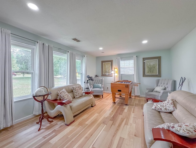7420 Hickock Ct, Tallahassee, FL 32311 - living area featuring healthy amount of natural light, light wood-style flooring, and recessed lighting
