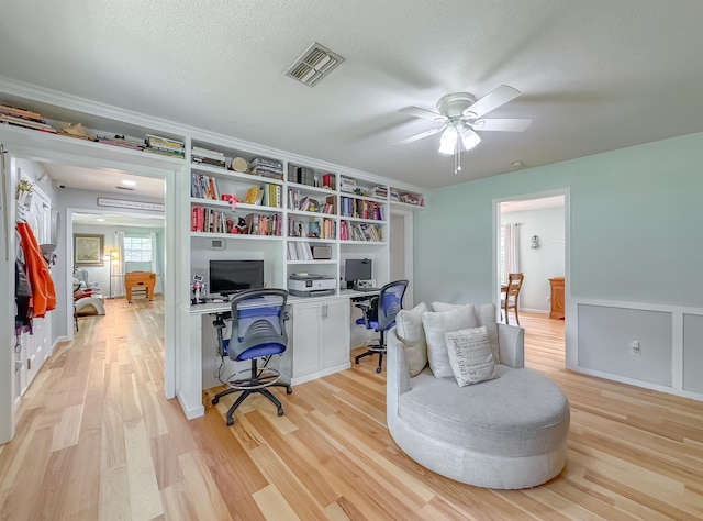 7420 Hickock Ct, Tallahassee, FL 32311 - office space featuring ceiling fan, light wood-style flooring, and ornamental molding
