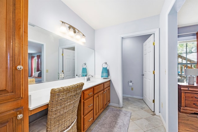 bathroom with vanity and tile patterned floors