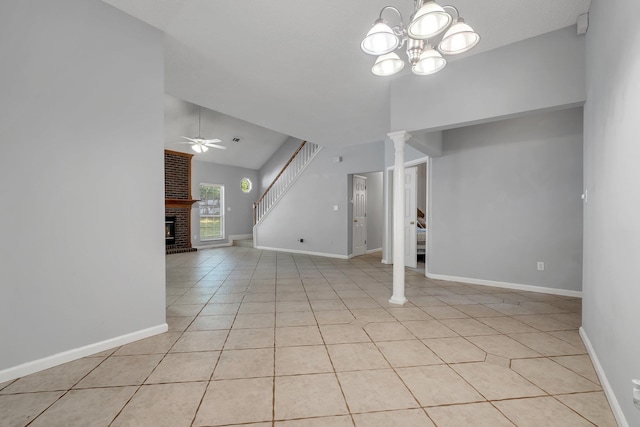 1520 Breamstone Rdg, Tallahassee, FL 32312 - unfurnished living room featuring a ceiling fan, a fireplace, stairs, light tile patterned flooring, and baseboards