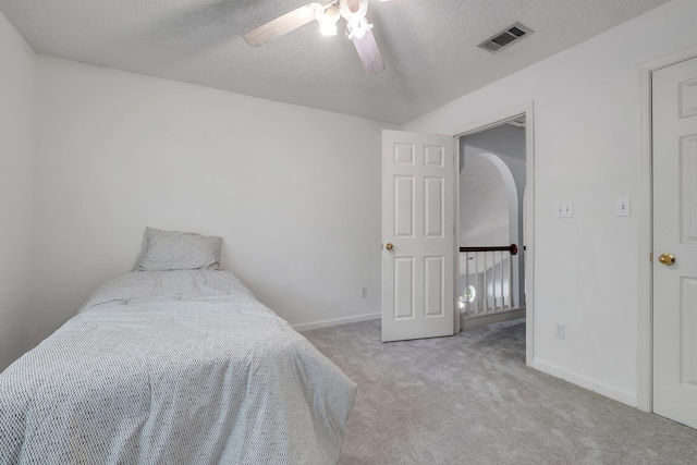 1520 Breamstone Rdg, Tallahassee, FL 32312 - carpeted bedroom featuring a textured ceiling, baseboards, and ceiling fan