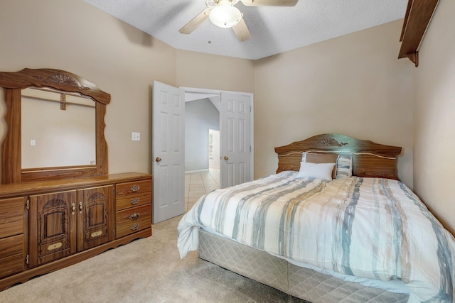 1520 Breamstone Rdg, Tallahassee, FL 32312 - bedroom featuring light colored carpet, ceiling fan, and a textured ceiling