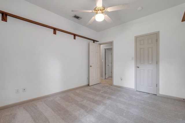1520 Breamstone Rdg, Tallahassee, FL 32312 - unfurnished bedroom featuring light carpet, baseboards, and ceiling fan