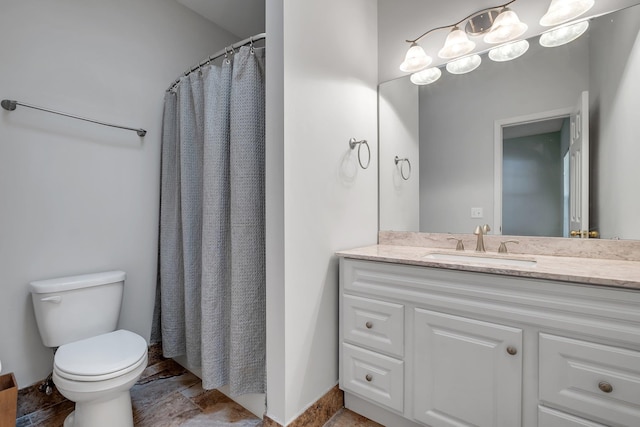 1520 Breamstone Rdg, Tallahassee, FL 32312 - full bathroom featuring toilet, vanity, stone finish floors, and curtained shower