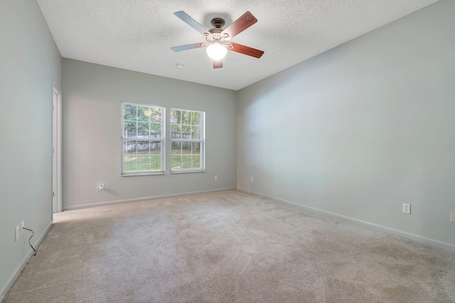 1520 Breamstone Rdg, Tallahassee, FL 32312 - spare room with a textured ceiling, carpet floors, ceiling fan, and baseboards