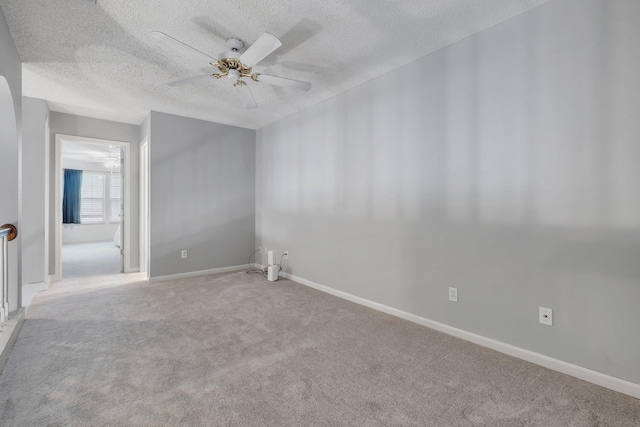 1520 Breamstone Rdg, Tallahassee, FL 32312 - empty room with a textured ceiling, ceiling fan, carpet, and baseboards
